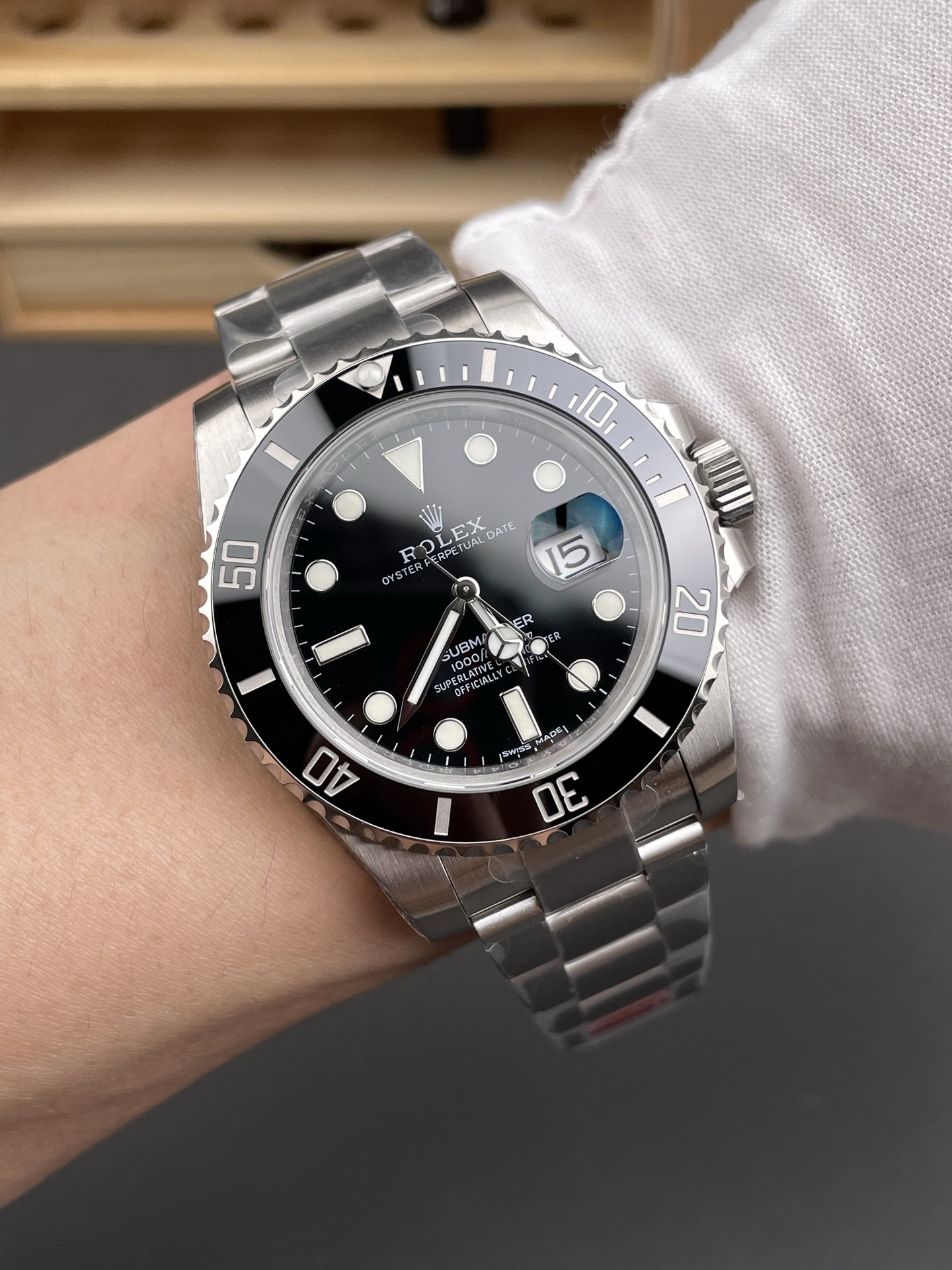 Rolex Submariner 126610LN replica on wrist showing case proportion and daily wear look